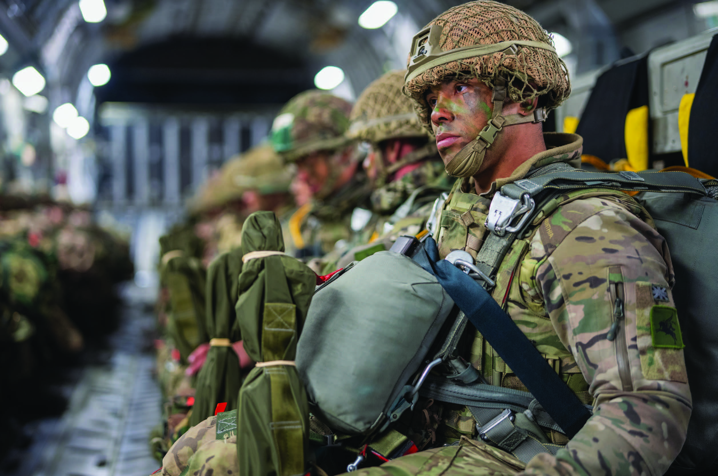 Soldiers of 82nd Airborne Division and 5th Quartermaster Theater Aerial Delivery Company, participating in exercise Swift Response 24, part of Defender Europe 24, prepare for joint forcible entry in tandem with their British counterparts, in Tallinn, Estonia, May 11, 2024 (U.S. Army/ Remington Henderson)